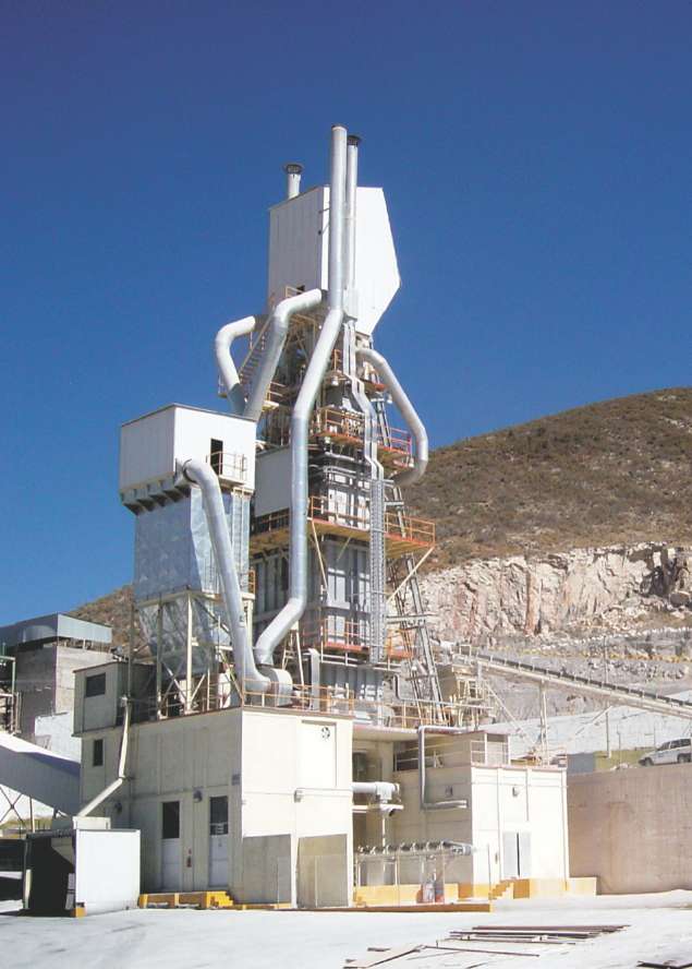 A photograph of a two shaft lime kiln for the production of lime from limestone in Mexico.